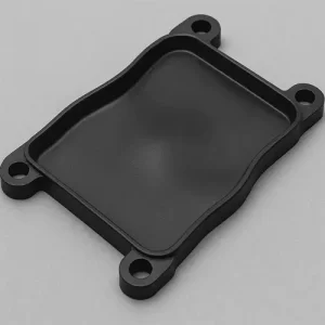 Warpage on an injection-molded plastic part, showing uneven cooling that causes the panel to bow out of plane