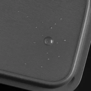 Surface air bubbles on an injection-molded plastic part caused by trapped gas during filling.