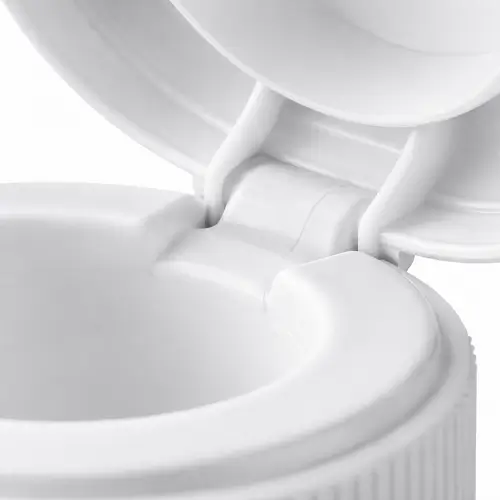 Close-up of a molded plastic living hinge on a flip-top cap