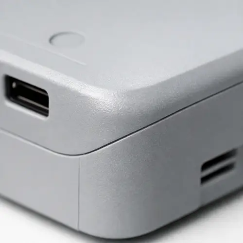 Visible parting line on an injection molded plastic housing surface