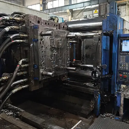 Injection molding machine in a real factory workshop