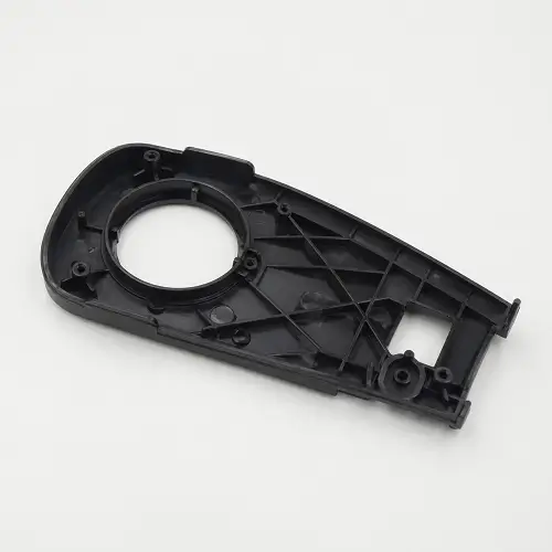 Black injection molded plastic part with ribs bosses and thick sections