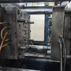 Open injection mold mounted on a real injection molding machine