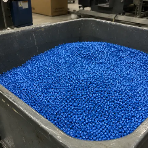 Blue plastic resin pellets used for injection molding